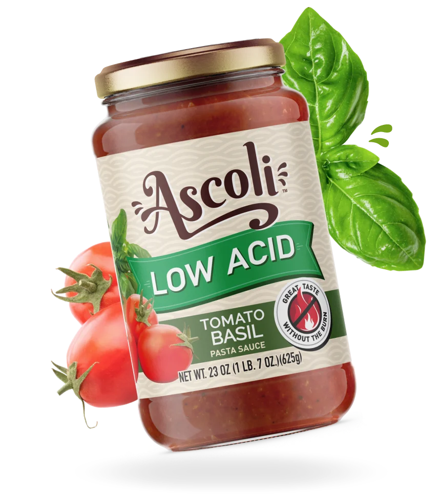 Ascoli low acid tomato basil pasta sauce bottle surrounded by fresh ingredients
