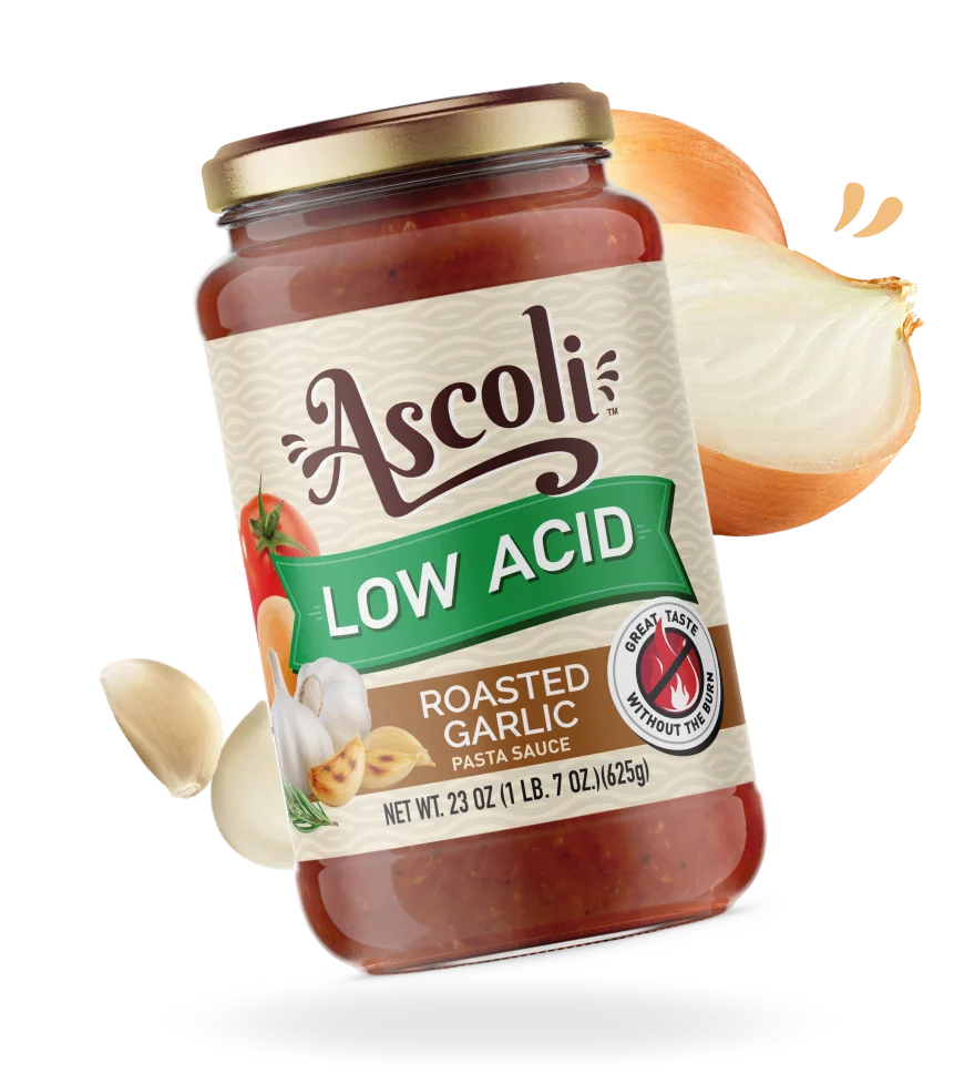 Ascoli low acid roasted garlic pasta sauce bottle surrounded by fresh ingredients